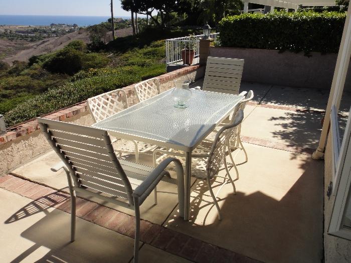 Square patio table and 6 chairs