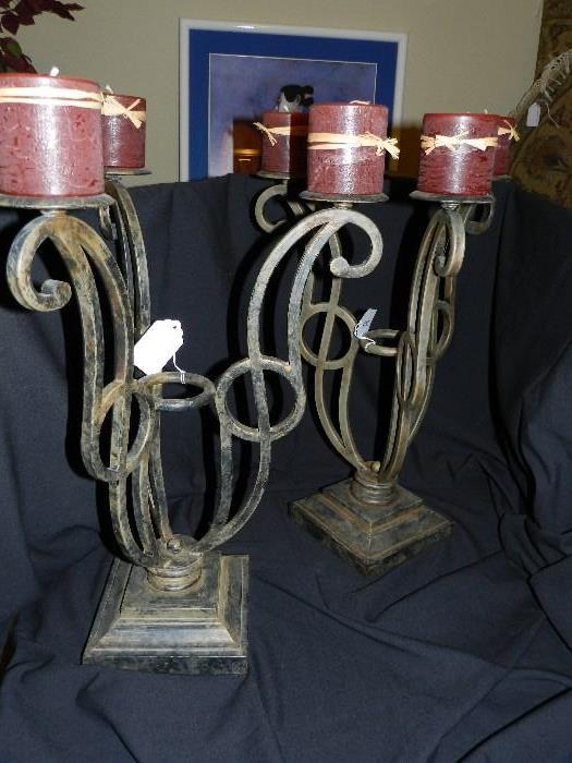 large iron candelabras