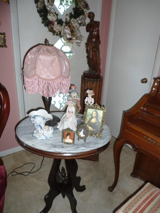 Small antique marble top table....lamps, linens, ...