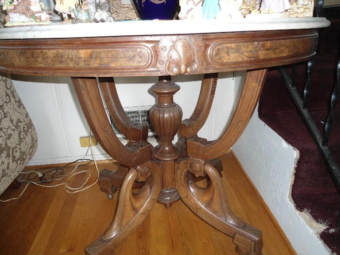 Located in the Den area...Burl/Antique Marble Top Victorian Table