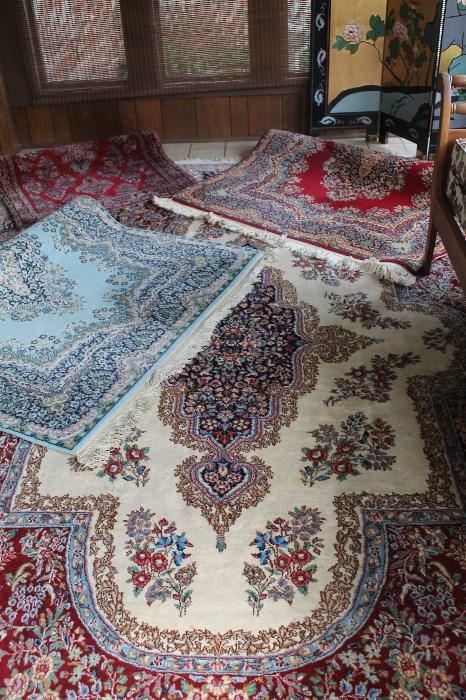 Large lot of rugs, one in center is room size Iranian rug