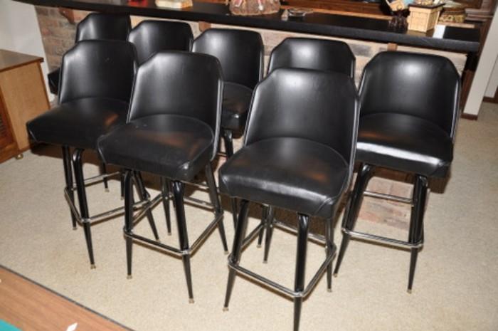 177  8 revolving black bar stools