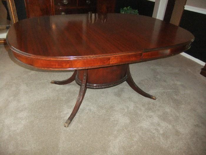 Mahogany Dining Table, Fancy Center Pedestal, Carving, Brass Claw feet