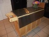 Kitchen Island w/ Stainless Top. Lots of storage