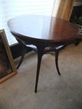 Cute Round Antique Mahogany Table,has Beading around the edge, tapered legs.