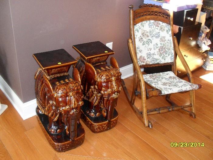 Antique folding rocking chair and ornate elephants