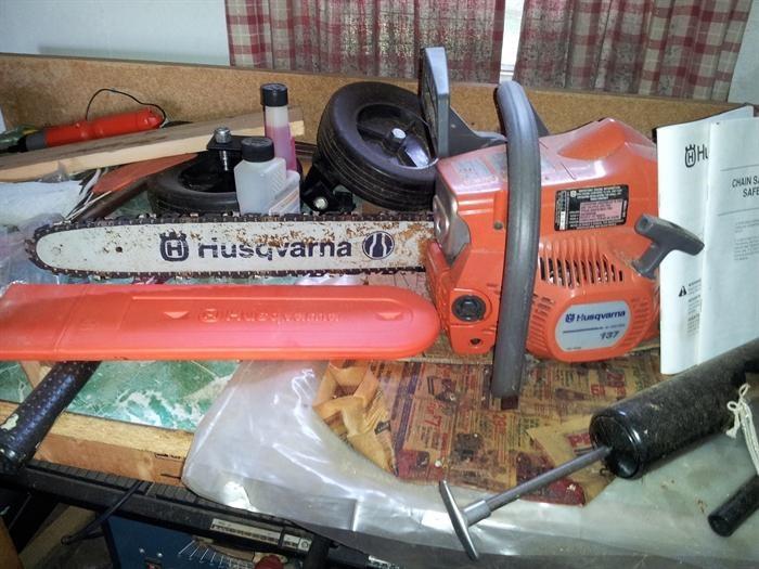 Hasqvarna Chainsaw with chain sheath and instruction/care booklets