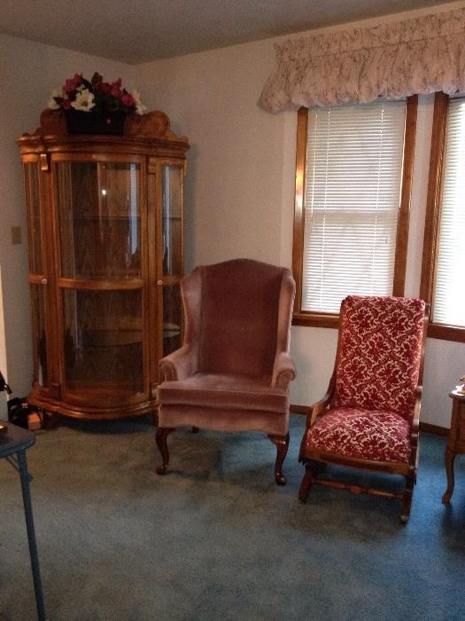 Exquisite Circa 1874 low arm rocker, wooden casters, original springs (reupholstered); *** Lovely Mauve Wing Back Chair;*** Gorgeous triple curved glass oak Curio Cabinet.