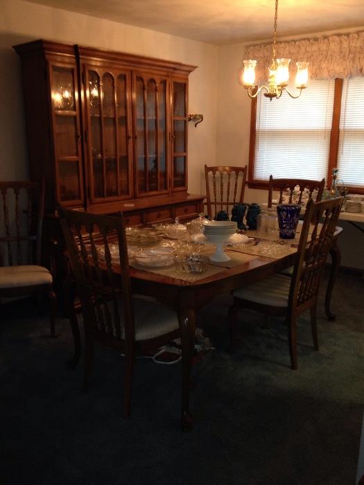 Thomasville Dining room set,   Lustrous Pecan Wood meticulously taken care of since 1966!  Purchased at Trombettas Furniture!   Beautiful extra long Hutch with tons of storage and drawers.  6 chairs, 2 being Captain Chairs.  Pads to protect the wood and a leaf to extend the table.  Great for Thanksgiving dinner and all Holidays!  