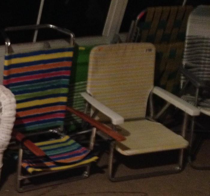 2 folding beach chairs