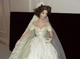 Porcelain dolls.  Most with certificates of authenticity
