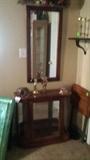 small curio and mirror