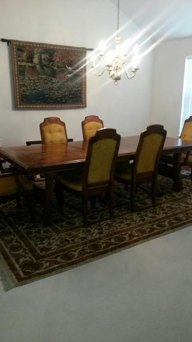 Gorgeous 108" Mid-Century tressel table with 6 chairs.  Excellent condition.  Will start at $2200.  Rug starts at $700. 