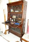 Victorian leaded-glass bookshelves with drop-down writing surface