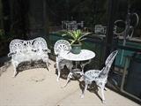 Pr. of Aluminum love seats, 2 chairs & table 