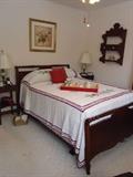 1930's vintage bed: chenile bedspreads: pine display shelf: antique lamps