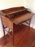 Theodore Alexander desk. Be sure to Google him. This will be affordable! 