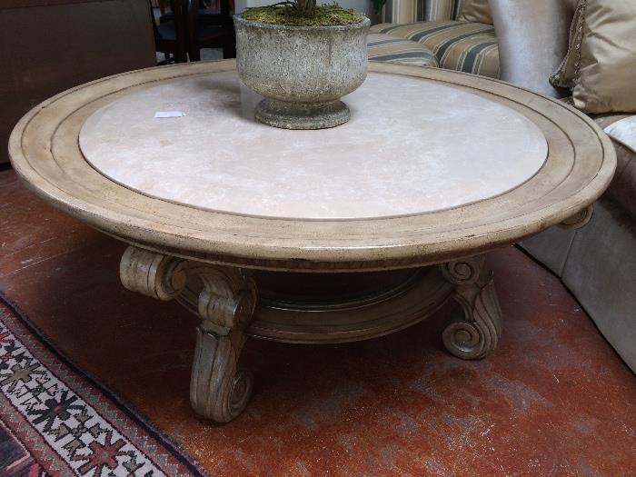 Marge Carson cocktail table with a beveled Limestone slab on the top and a beveled glass shelve on the bottom.  Retail $6,400 our price $1895.