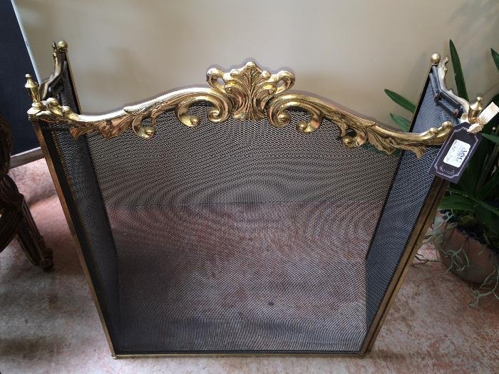 Vintage polished brass fireplace screen.  $195