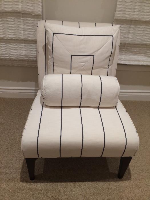 "Brand New" Pearson furniture blue and white striped chair.  I have 2 just a like I would prefer to sell them together.  I ordered them and it took 3 months to receive and once they showed up I was selling my home.  I have never used them.  I paid $3,200 each selling them for $1,395 each.  The fabric was a custom Kravet fabric that I sent to Pearson.  They are 8 way hand tied with a solid wood frame this is the best quality upholstery in the world.  