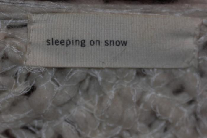 label on clothes in closet