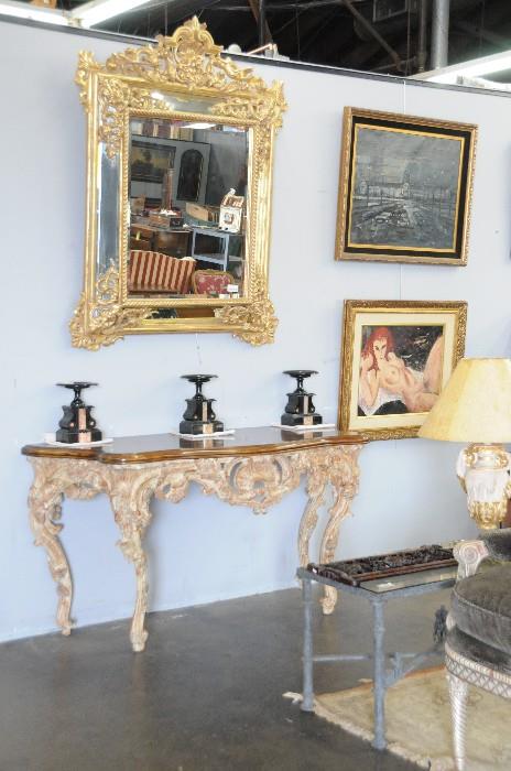 French gilt wall mirror, carved console tables (one of pair)