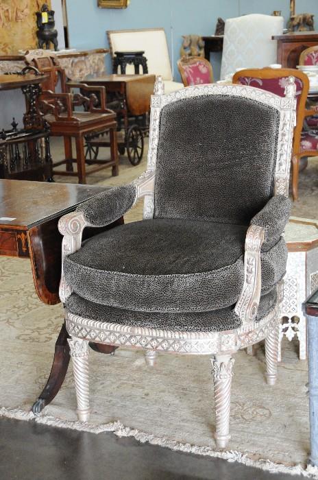 Carved fauteuil (one of pair)