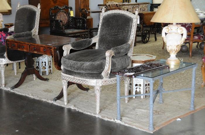 Pair of carved and silvered fauteuils, English writing table