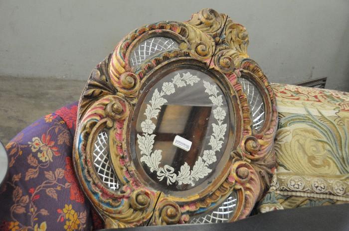 Carved and etched wall mirror