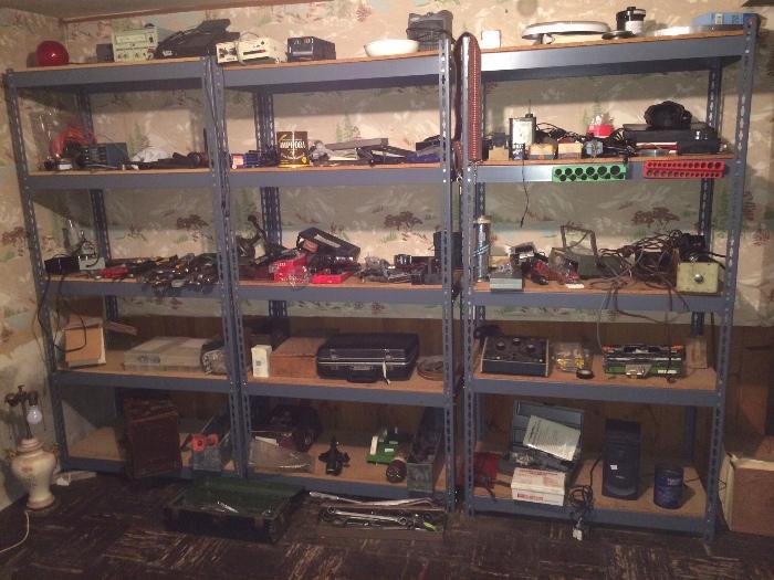 4 heavy duty shelving units and tools galore ! 