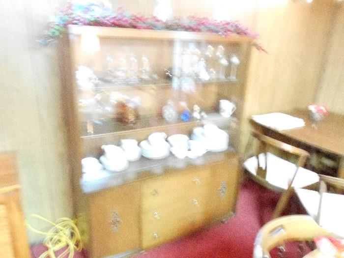 CHINA CABINET WITH SLIDING GLASS FRONT.  BEAUTIFUL SET OF CHINA, ALSO.