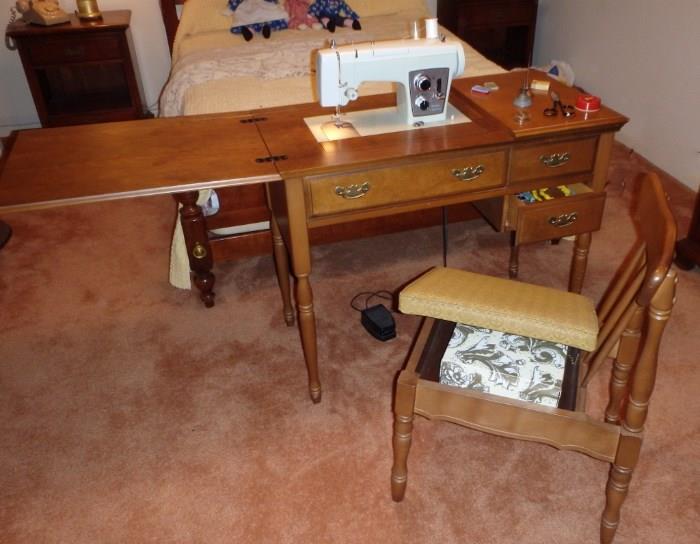Sears Kenmore Sewing Machine and Cabinet.  Chair opens