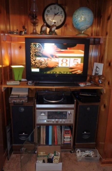 32" TV RCA, Stereo Component System, Record Albums (even more in the basement). 