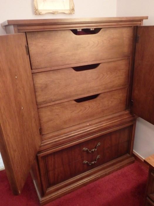 Inside of the armoire chest of drawers