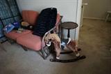 Queen Anne pedestal table, rocking horse, rattan sofa