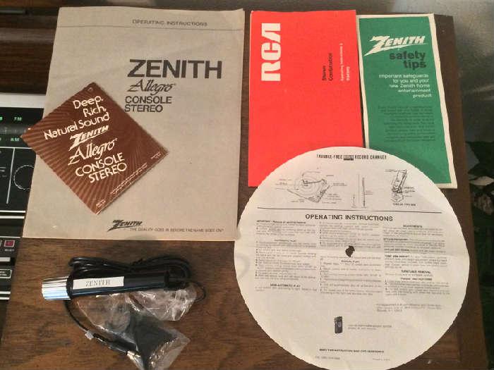 paperwork and microphone that came with the stereo cabinet