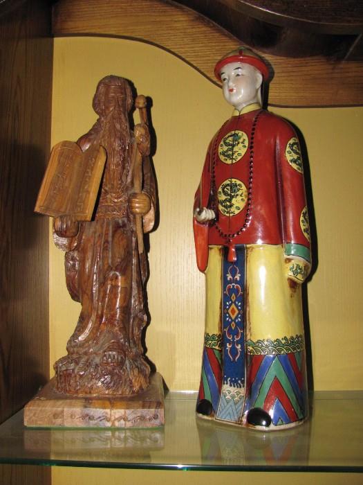 Left, large Carved olive wood sculpture of Moses from Israel. Right, Chinese ceramic man 