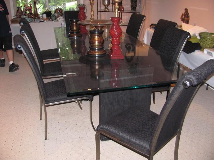 Custom made Table with glass top, seats up to 12. The table measures 45" X 125". Set of 8 Metal ans upolstered  DIA, deco revival chairs