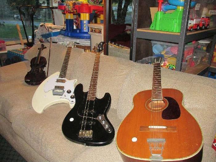 the toys in the background of this picture are not for sale. The couch and musical instruments ARE for sale.