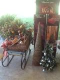 carport full of items , Christmas, out door furniture