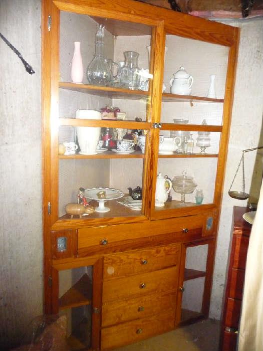 corner cabinet, lots of dishes all over the house