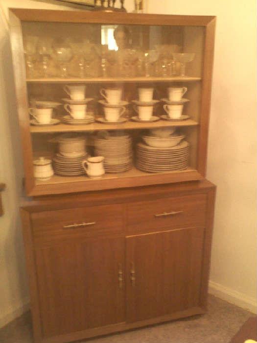 mid century dining set, china cabinet with matching table and four chairs all in excellent condition