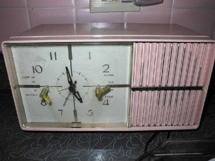 Yes, baby, a pink vintage clock!