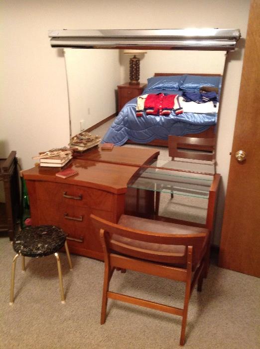 Mid century dresser/vanity with chair and mirror.
