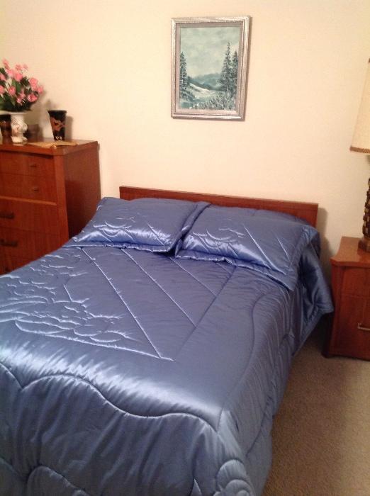 Mid century bedroom set, blue bedding, homeowners art