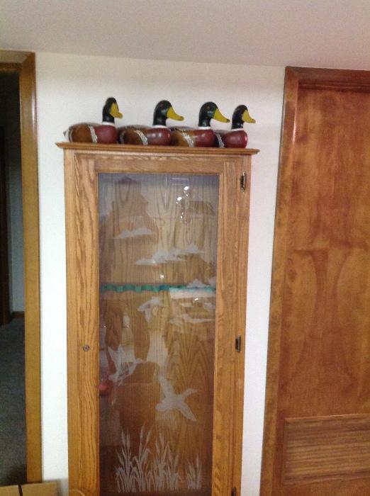 Gun cabinet, duck decoys