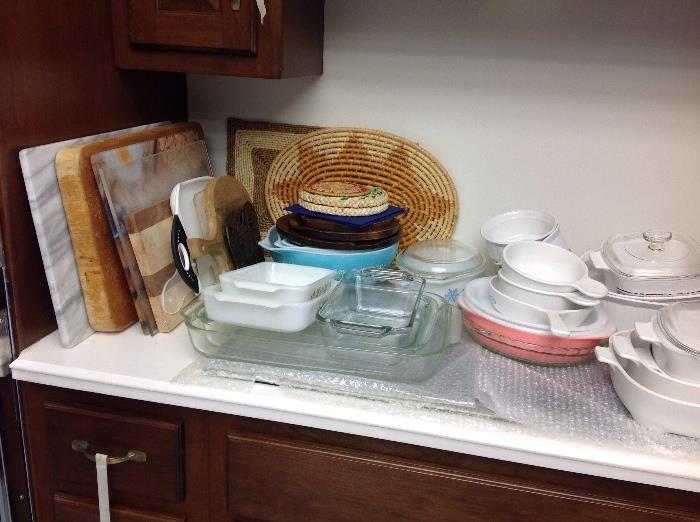 Corelle and Pyrex dishes, cutting boards