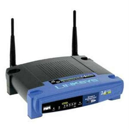 Like new: LINKSYS All-in-one Internet-sharing router, 4-port switch, and Wireless-G (802.11g) access point