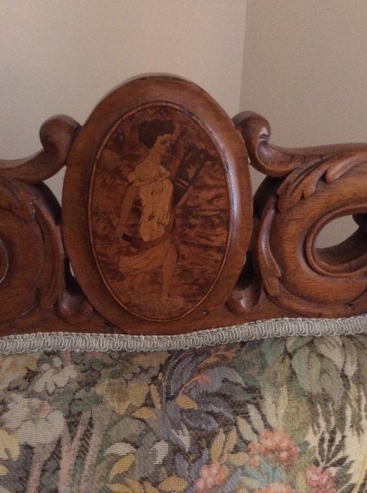 Detail of the inlaid wood on the formal couch.