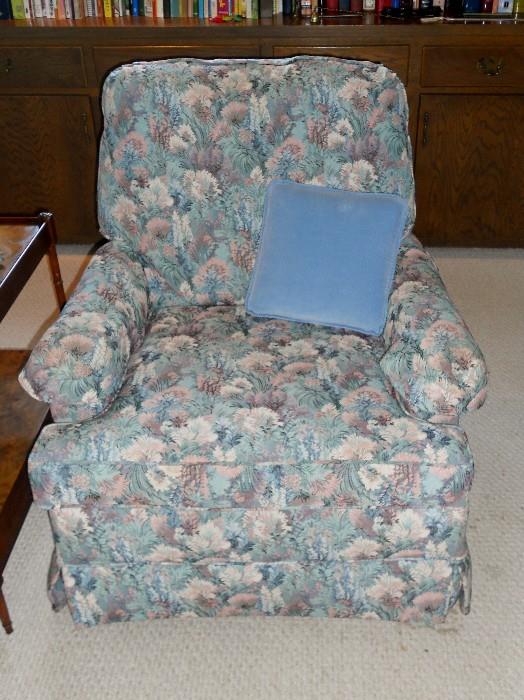 One of 2 Floral Den Chairs by Braddington Young--swivels, rocks and has manual foot rest